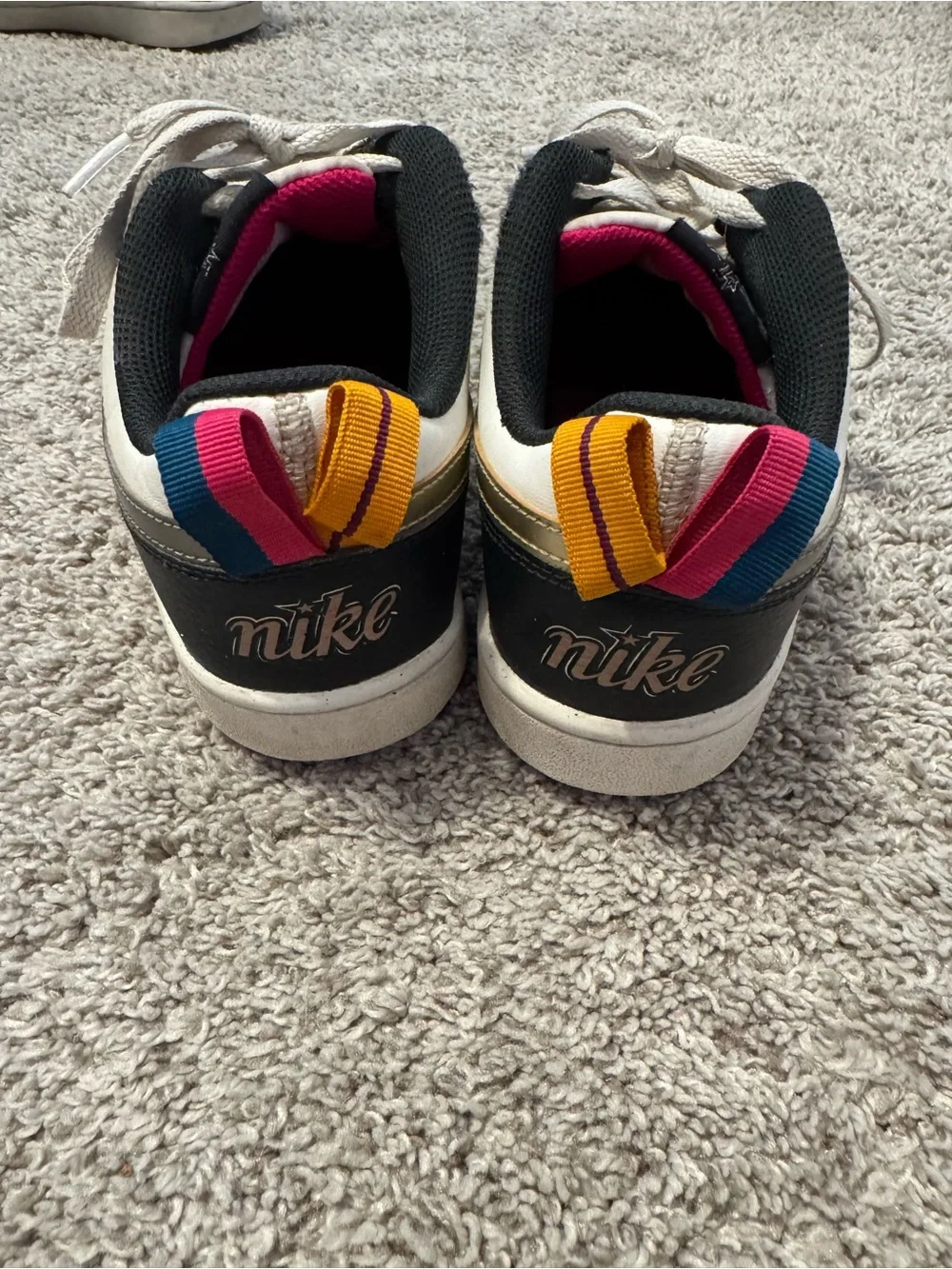Nike Low-Top Sneakers in White, Black & Gold with Pink Accents